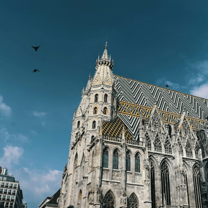 low-angle photo of white cathedral during daytime