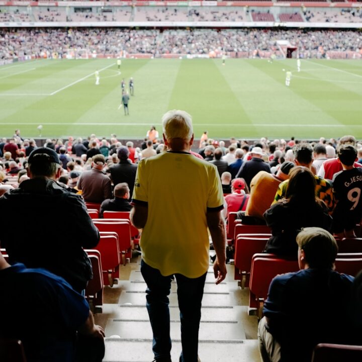 a person walking on a football field