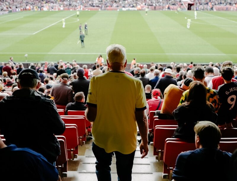a person walking on a football field