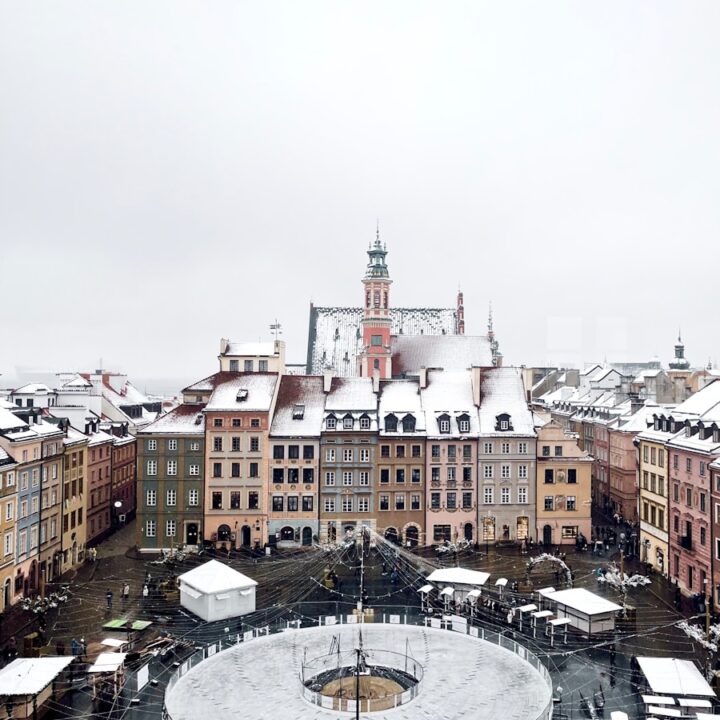 an aerial view of a city in winter