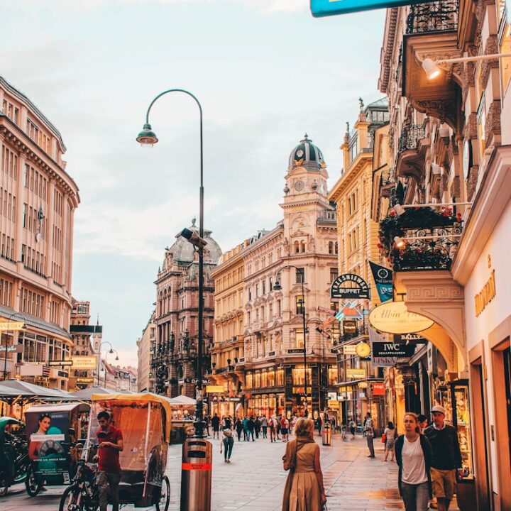 people walking beside Berlitz building during daytime